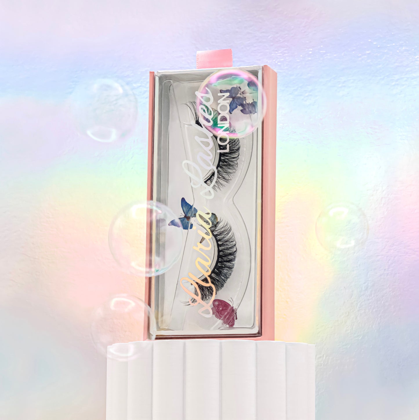 Eyelashes in a decorative box with colorful background