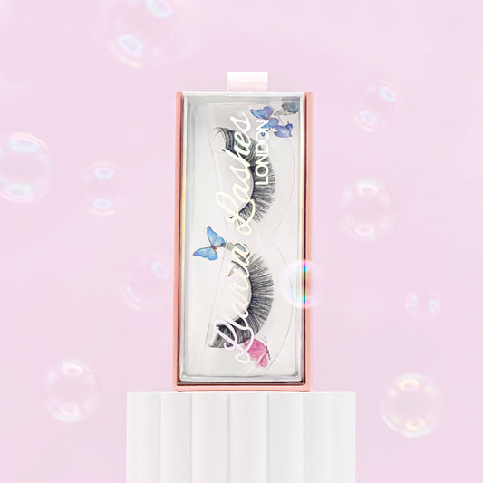Eyelash packaging with 'Blushed London' branding on a pink background
