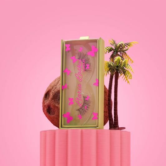 Makeup product with decorative elements on a pink background
